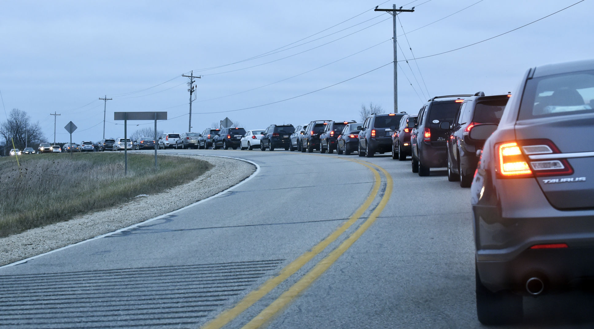 Long line of cars makes its way through Burlington